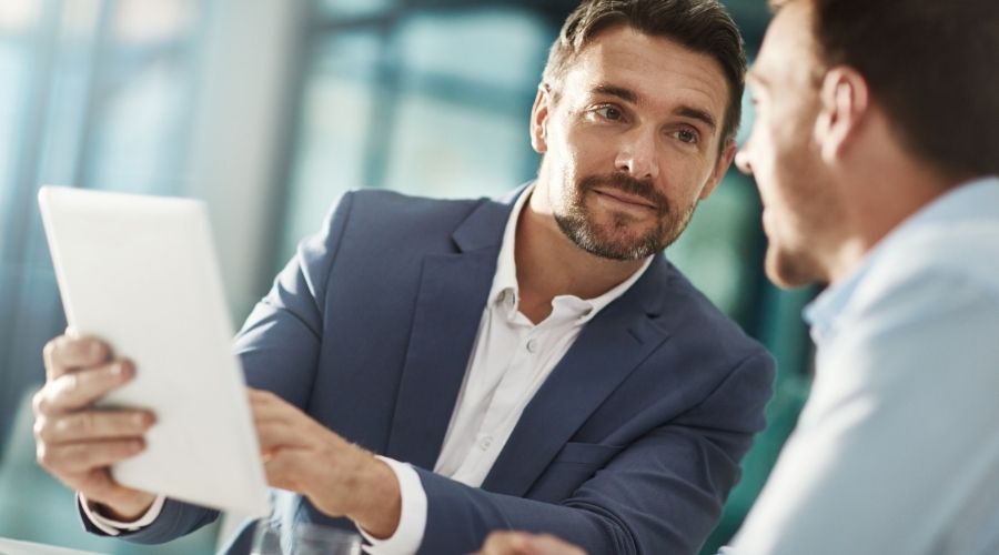 Two businessmen talking