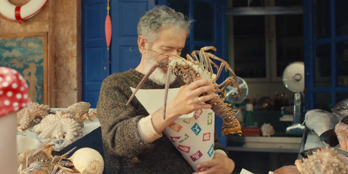 Fisherman holding lobster